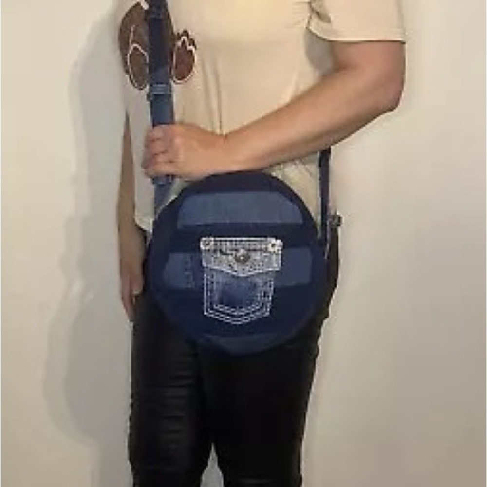 Designed handmade purse from recycled clothes